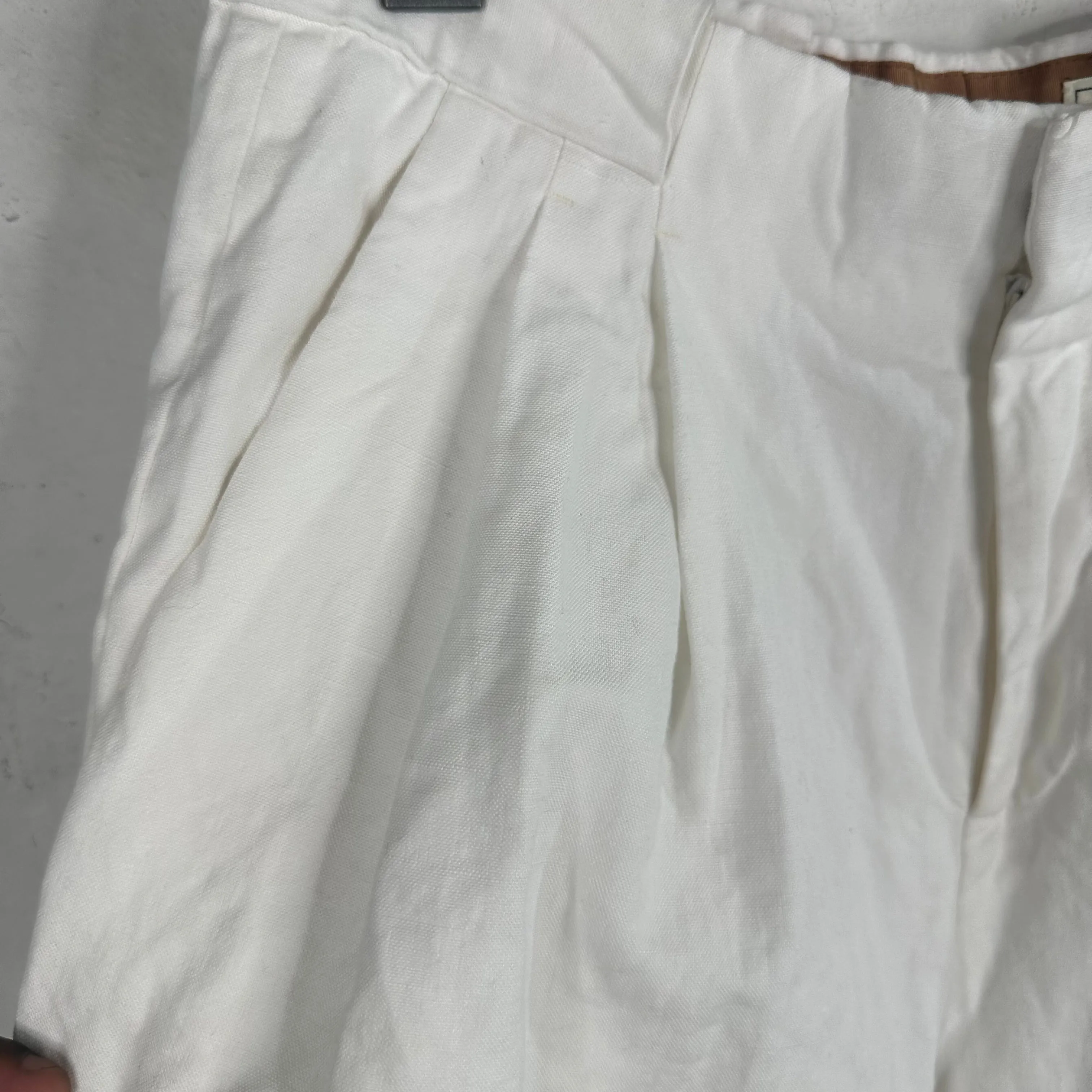 B  Pleated White Shorts