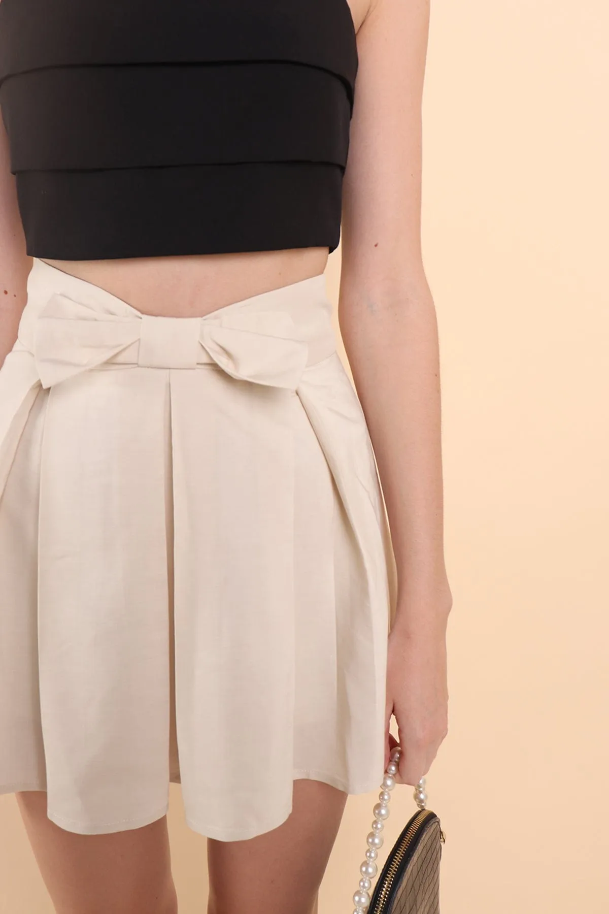 COSETTE RIBBON PLEATED SKORTS IN LATTE