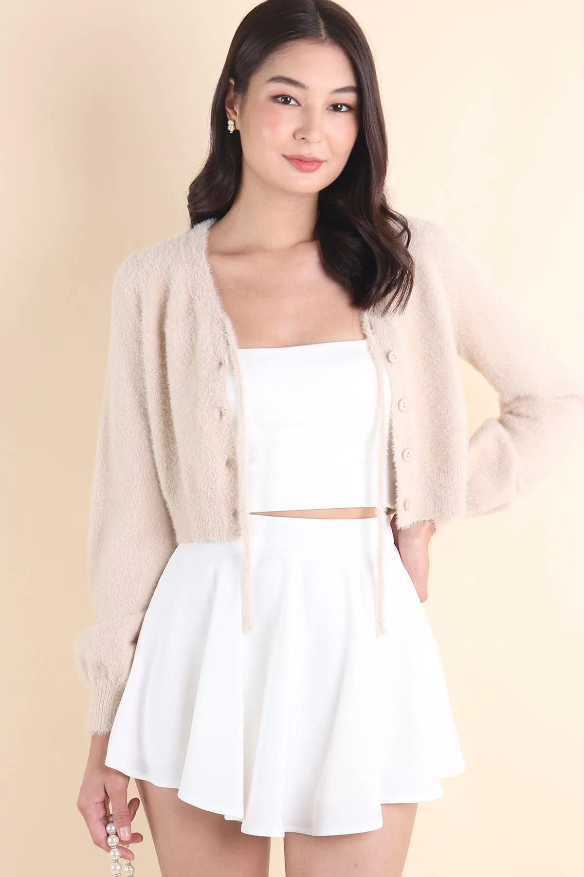 ELIZ BOW FURRY CARDIGAN IN ALMOND