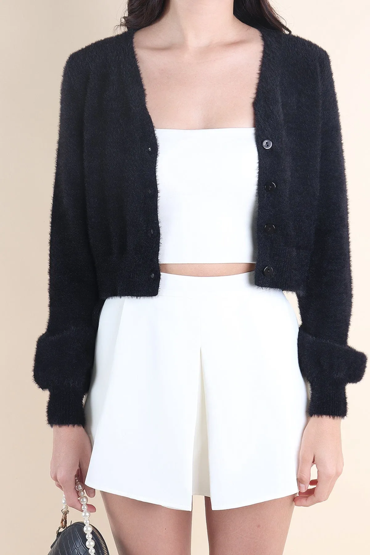 ELIZ BOW FURRY CARDIGAN IN BLACK