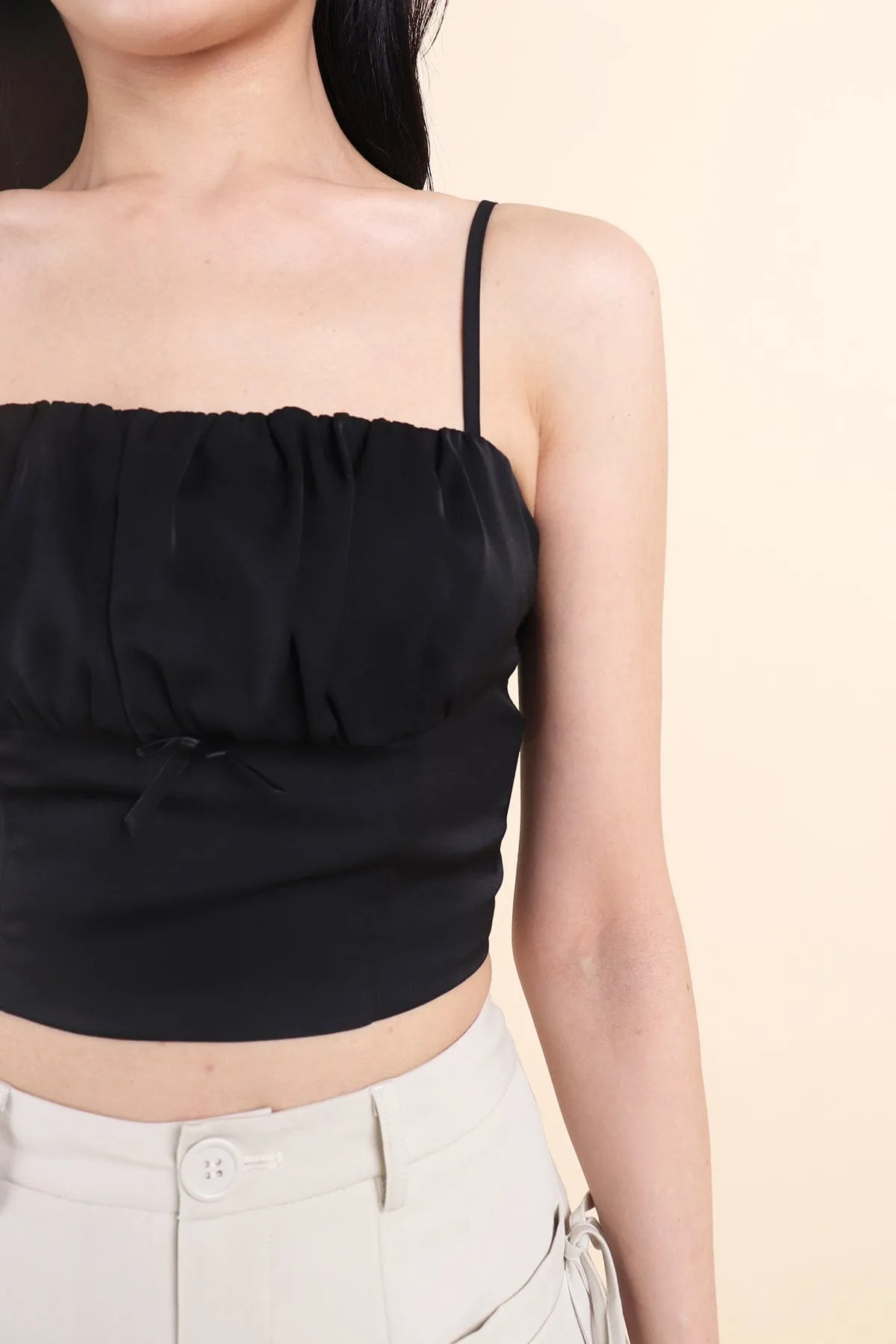 LOVEA RUCHED RIBBON TOP IN BLACK