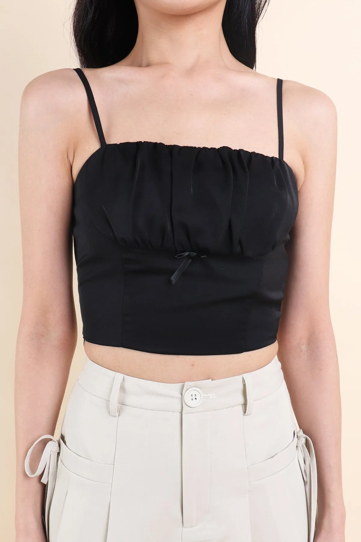 LOVEA RUCHED RIBBON TOP IN BLACK